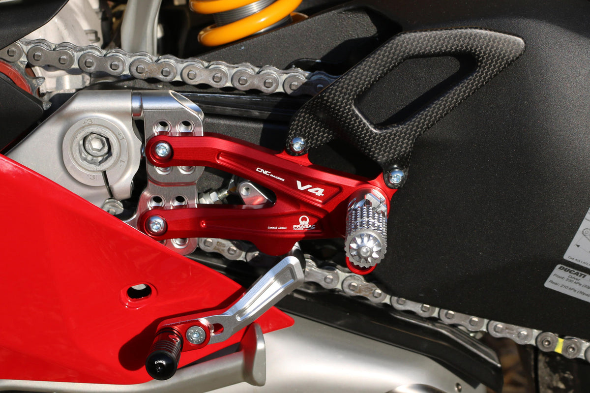 CNC Racing PRAMAC RACING LIMITED EDITION RPS Adjustable Rearset for the Ducati Panigale V4 / S / R - with Carbon Heel guard